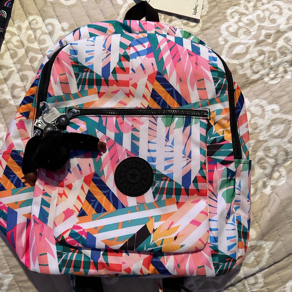 Brand new never used. Still has tags Kipling backpack
